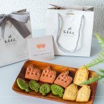 伴手禮贈(zèng)送『迦南園烘焙庇護(hù)工場(chǎng)』的公益餅乾，可愛、溫馨兼顧著美味，為這場(chǎng)活動(dòng)增添一份愛的溫度。